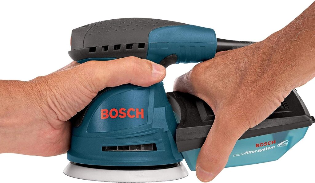 BOSCH ROS20VSC Palm Sander 2.5 Amp 5 In. Corded Variable Speed Random Orbital Sander/Polisher Kit with Dust Collector and Soft Carrying Bag, Blue